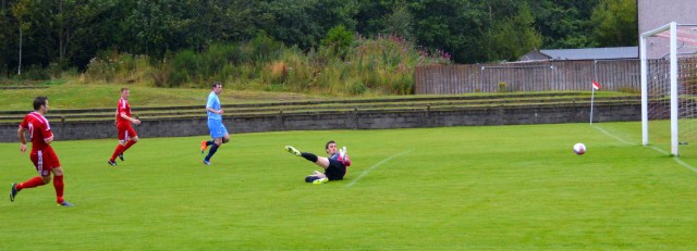 Mick McCann slots home the equaliser
