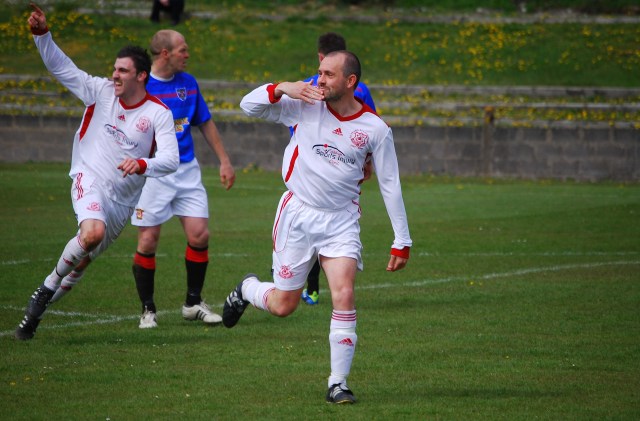 Potts celebrates a goal against the Medda