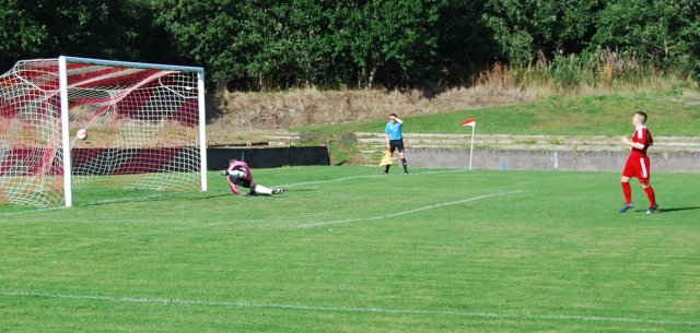 Jamie McKernon scores from the spot