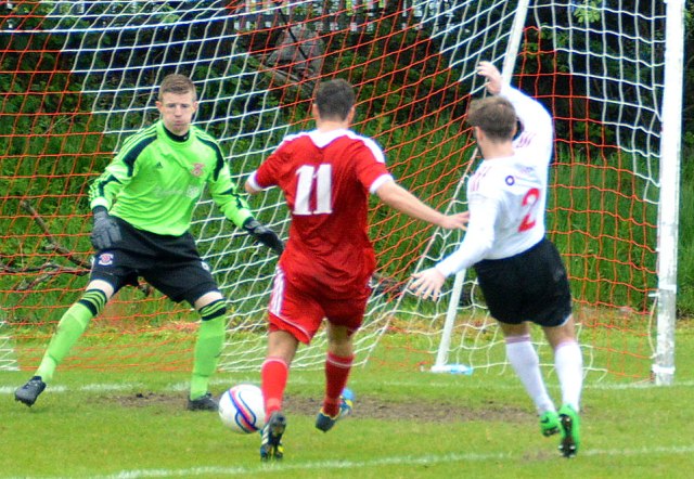 Cammy clips home the Glens third goal