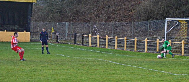 Alain Kinney slots home the spot kick