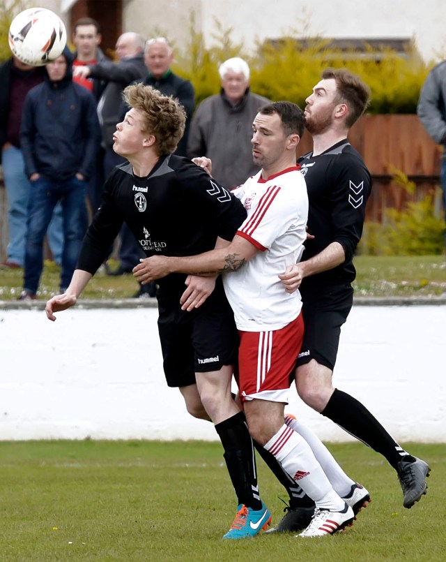 Joe Andrew sandwiched by Blair Anderson and Robert Kirkland (Photo courtesy of John B. Vass)