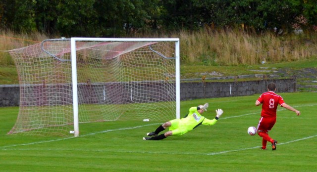 Alan Colquhouns saves from Mick McCann